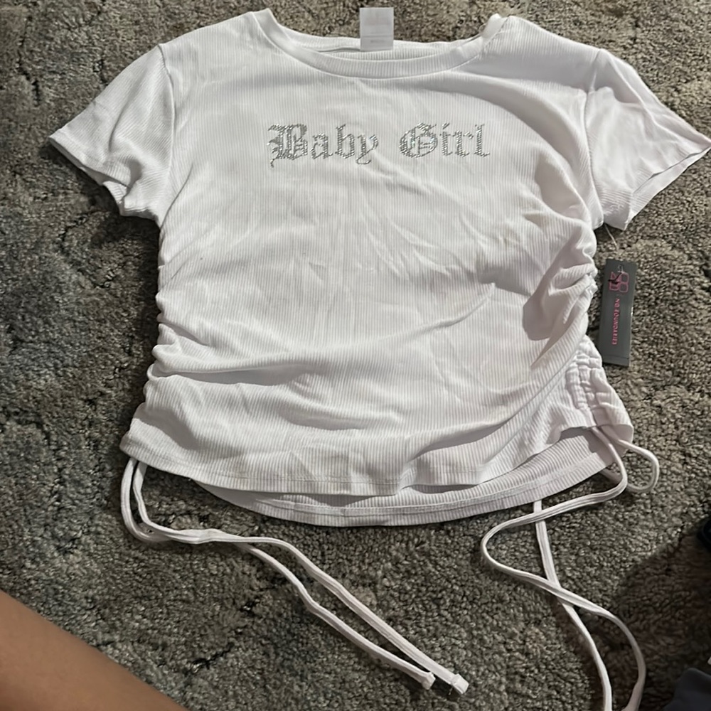 It’s a cute shirt never worn still has a tag on it.